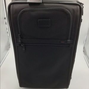 TUMI roll on luggage BRAND NEW NEVER USED